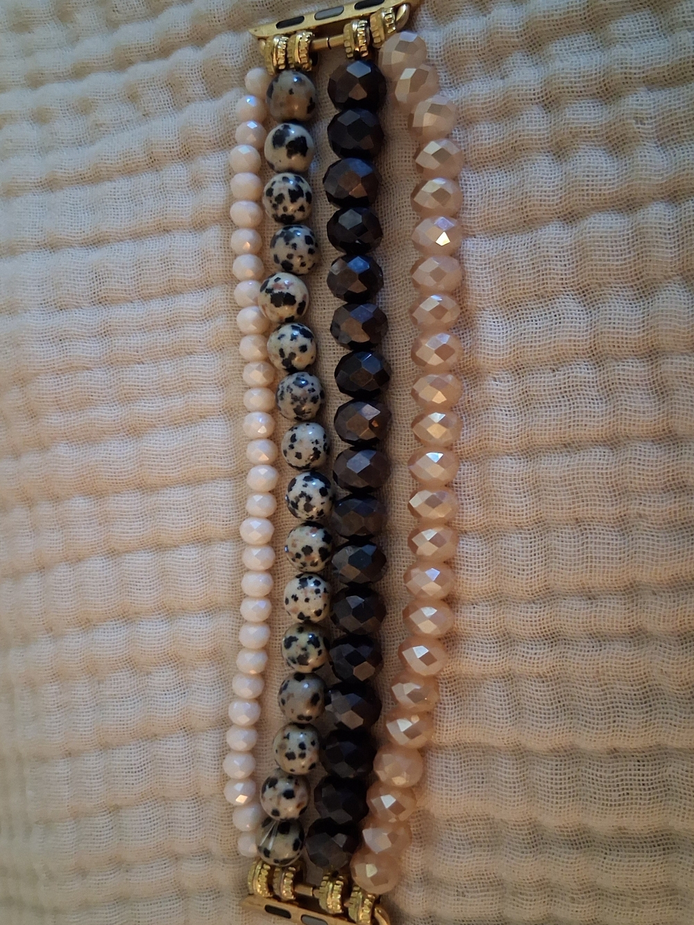 Multistrand Beaded Bracelet in Black, Cream, and Tan